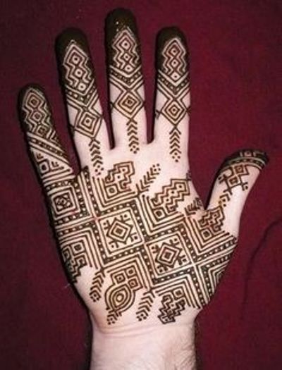 mehendi design with circular patterns