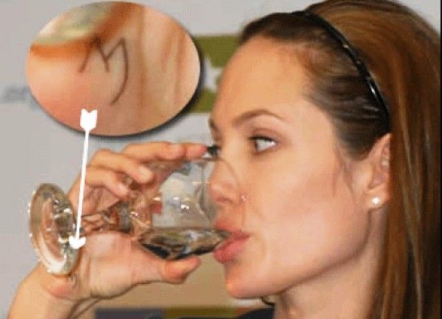 Angelina Jolie tattoo letter M