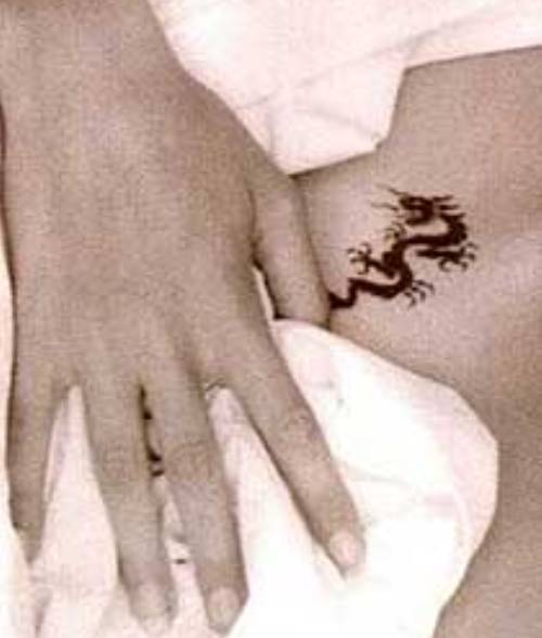 angelina jolie-blue tongue dragon tattoo