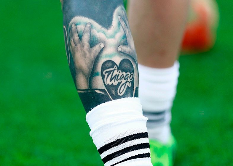 lionel messi-handprints tattoo