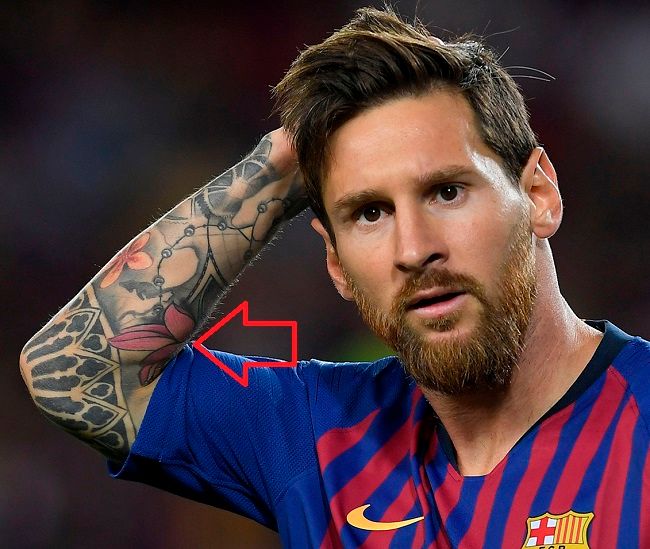 lionel messi-lotus tattoo