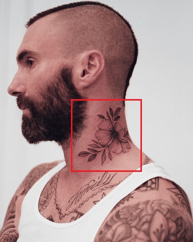 flower tattoo of adam levine