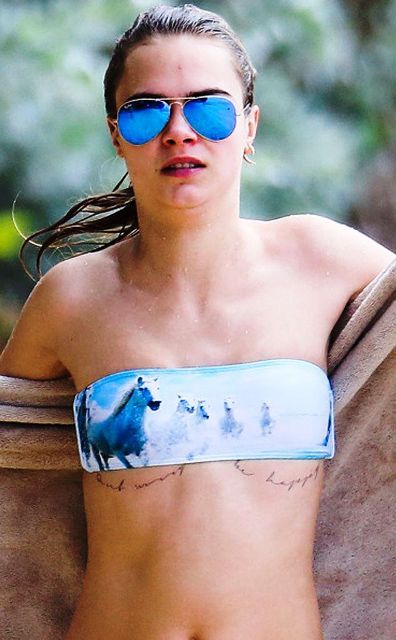 Cara Delevingne tattoo Dont Worry Be Happy