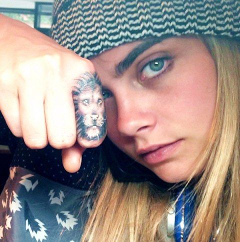 Cara Delevingne tattoo Lion Face