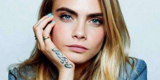 Cara Delevingne unveils giant new tattoo featuring a tiger and a naked  woman  Mirror Online