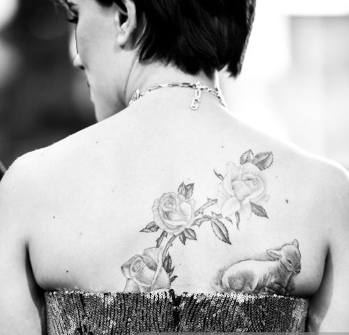 Lamb with floral design tattoo- Johanson