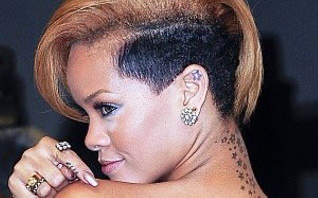 Rihanna tattoos Stars on Her ear