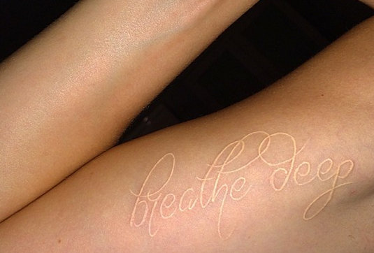 cara delevingne-breathe deep tattoo