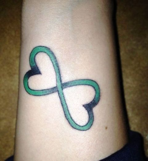 life and love symbol tattoo