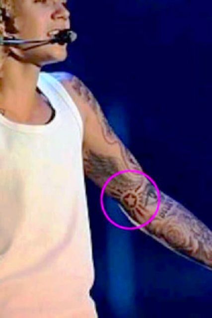 Justin Bieber Tattoo Star on Left Arm