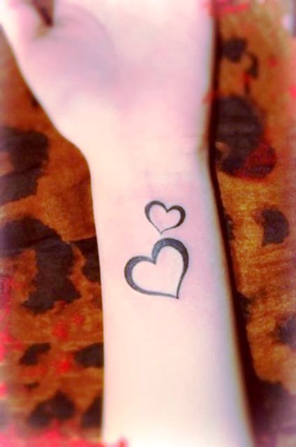 life and love symbol tattoo