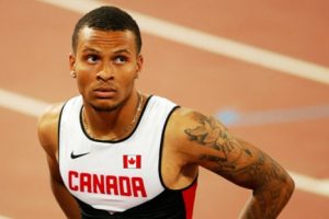 Andre De Grasse’s 5 Tattoos & Their Meanings