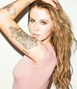 Ireland Baldwin's 23 Tattoos & Their Meanings - Body Art Guru