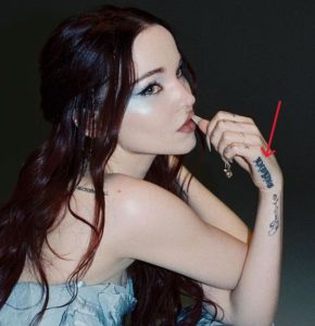 Dove Cameron's 23 Tattoos & Their Meanings - Body Art Guru