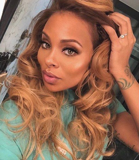 Eva Marcille Swirls Tattoo. 