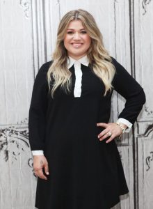 Kelly Clarkson's 14 Tattoos & Their Meanings - Body Art Guru