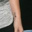 Kelly Clarkson's 14 Tattoos & Their Meanings - Body Art Guru