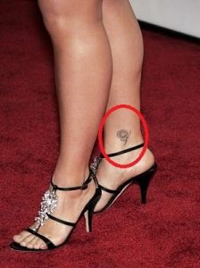 Kelly Clarkson's 14 Tattoos & Their Meanings - Body Art Guru