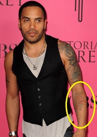 Lenny Kravitz's 9 Tattoos & Their Meanings - Body Art Guru