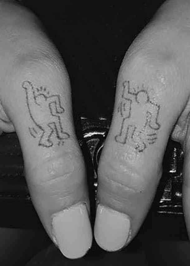 Dua Lipa Dancing People Thumb Tattoos