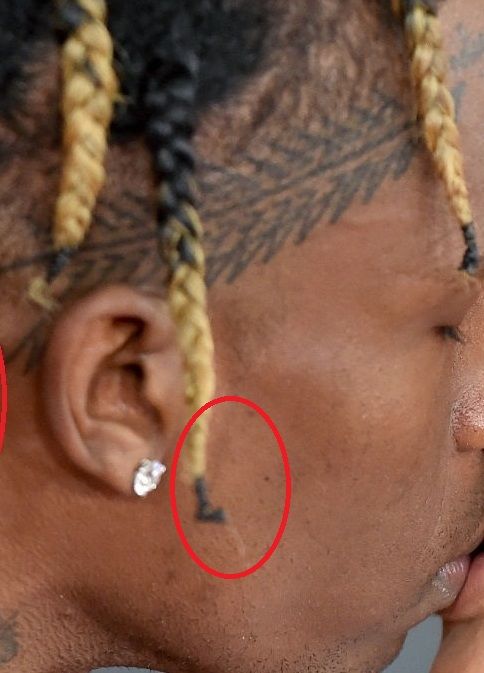 Travis scott L tattoo