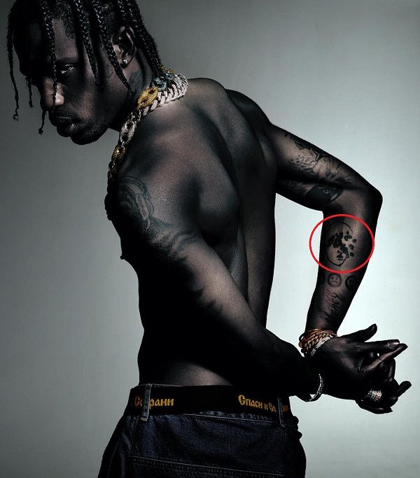 Travis scott-broken head tattoo