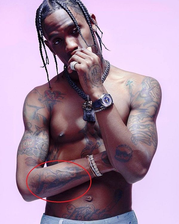 Undefined design on left arm-travis scott