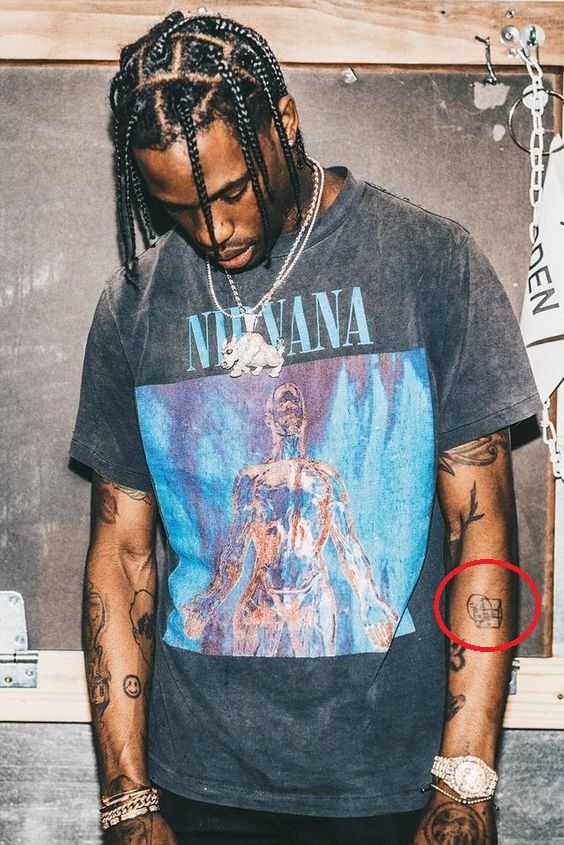 Travis Scotts Tattoos Their Meanings Body Art Guru