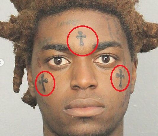 what-does-a-tattoo-of-a-cross-on-the-forehead-mean