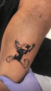daffy duck-nicky jam tattoo