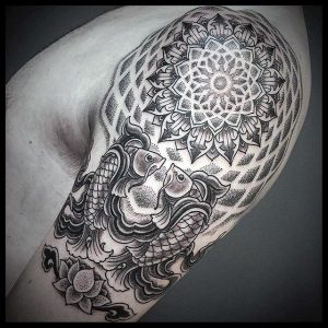 geometrical dotwork pattern male pisces arm tattoos compressed 1