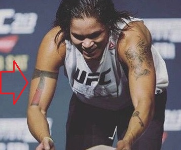 Amanda Nunes Right Arm Ribbon Tattoo