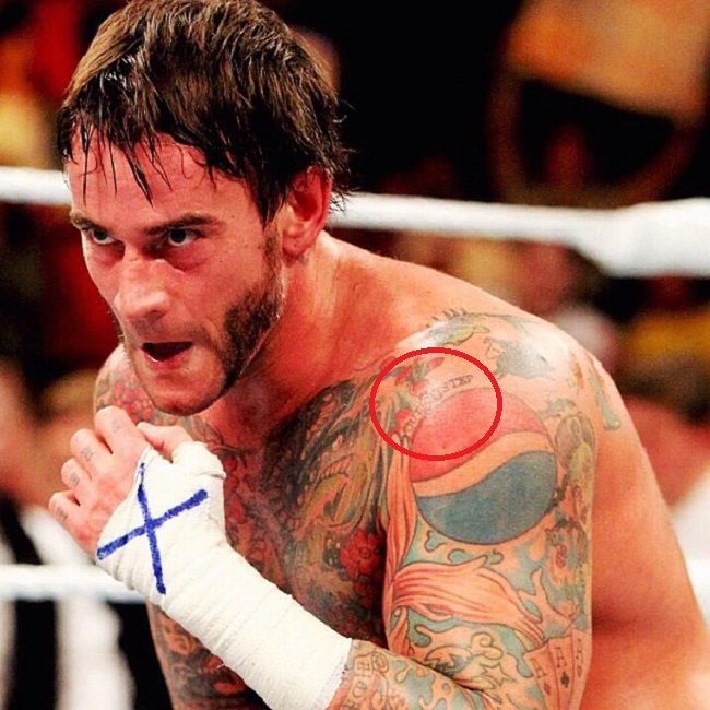 CM Punk-out of step tattoo