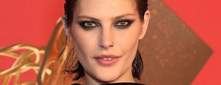 Catherine McNeil’s 58 Tattoos & Their Meanings