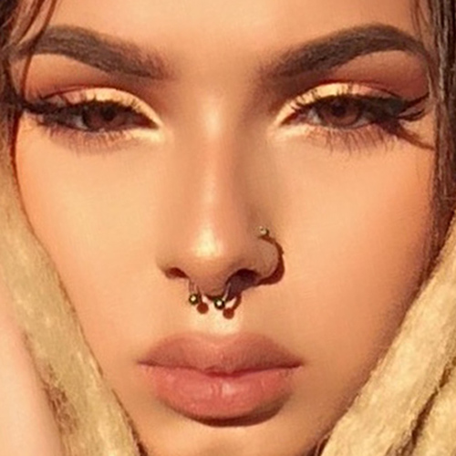 2 nose rings on each side