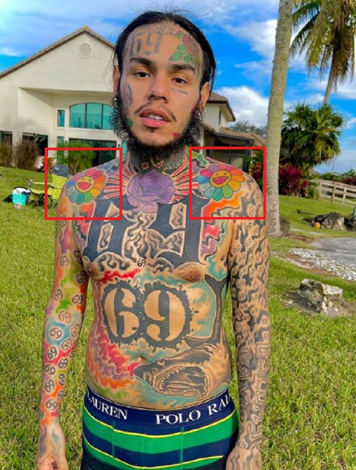 6ix9ine-multicolored flowers tattoo