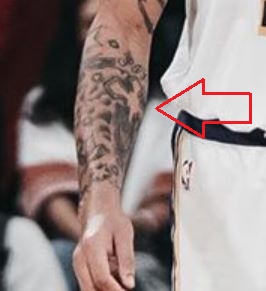 Anthony Davis cross tattoo