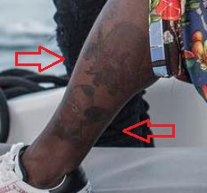 Gucci Mane simpsons looney tunes tattoo