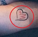 William Singe heart tattoo