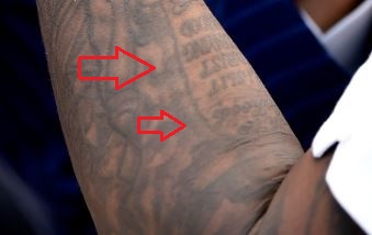 Usher scroll tattoo