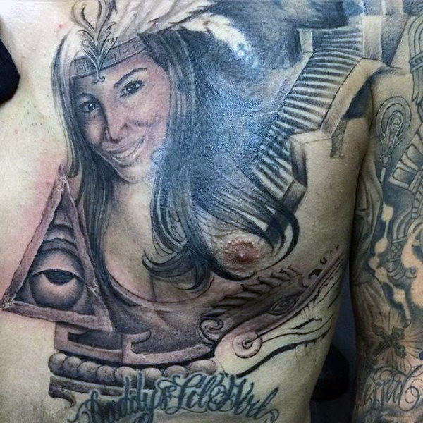 aztec chest and arm tattoo for men