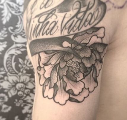 Nicolo Barella flower tattoo