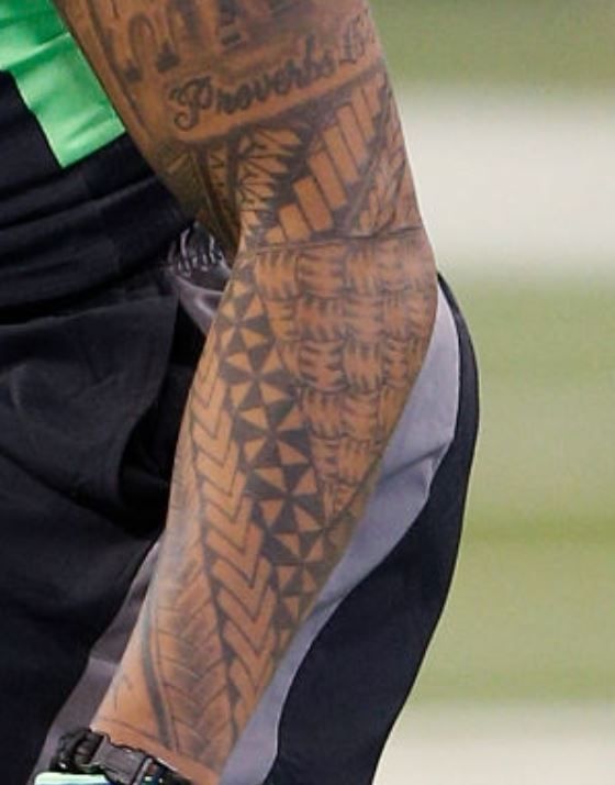 Sua design on left forearm-