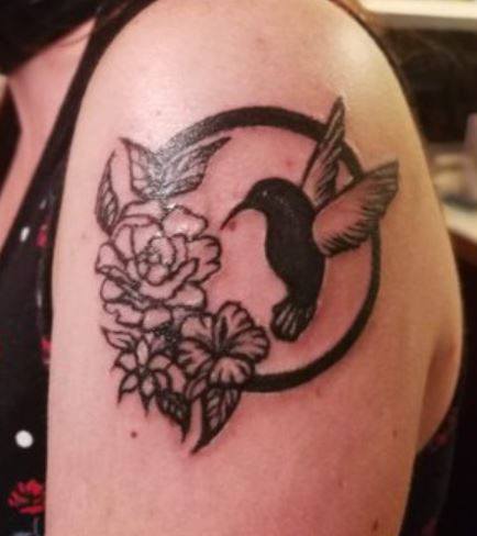 Eve Belle bird tattoo