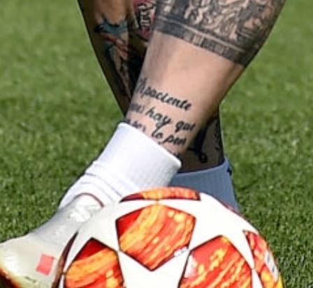 Alberto writing on leg Tattoo
