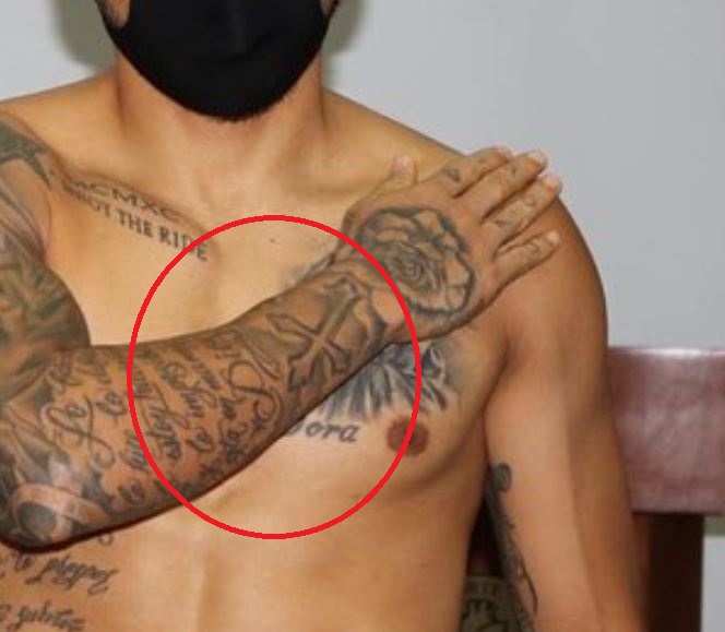Javier cross tattoo