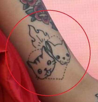 Mon Laferte dog cat tattoo