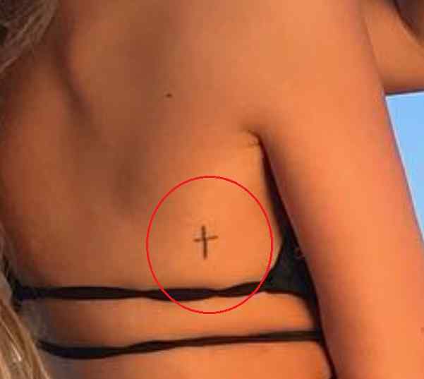 Erika Costell cross tattoo1