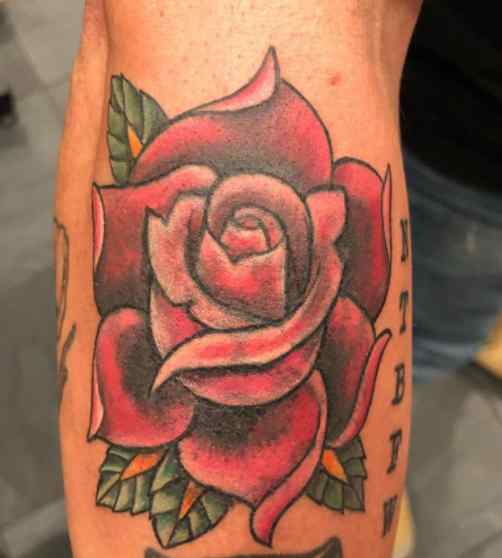 Titus Welliver rose tattoo
