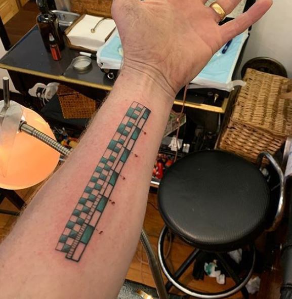 Adam Savage ruler tattoo